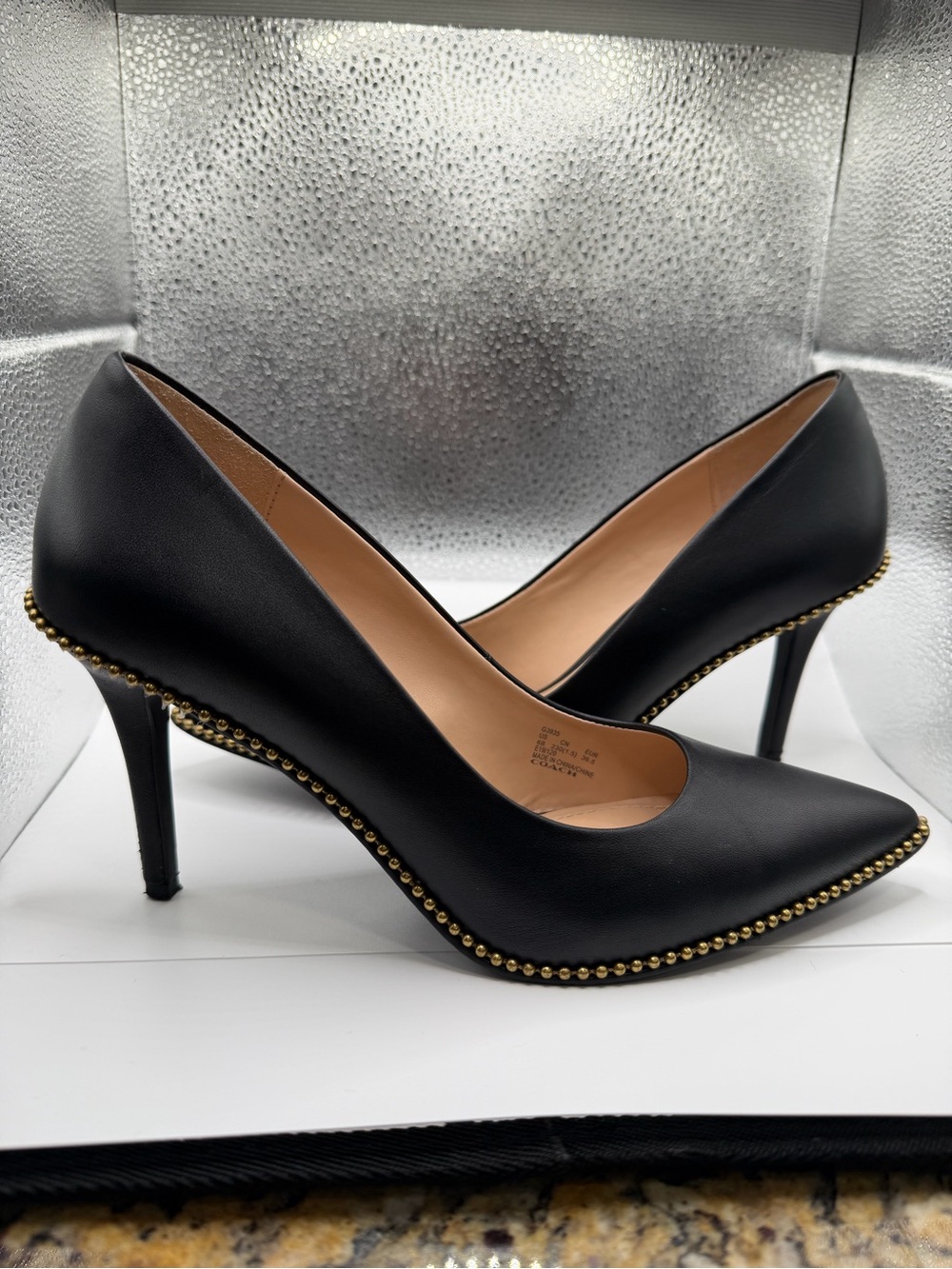 Coach Black Leather Pointed Toe Pumps with Gold Stud Trim